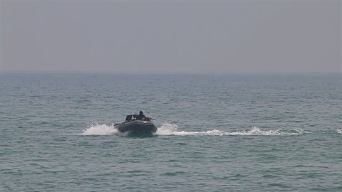 Varna, Bulgaria - April 2017: Navy seals training for terrorism attack in the sea with high speed motor boat