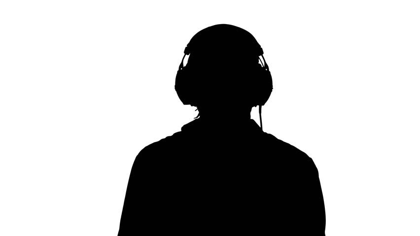 moving silhouette man headphones listening music: стоковое видео (без лицен...