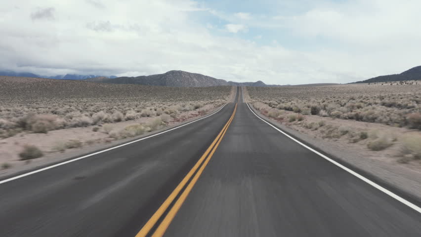 Driving USA: The open road – exciting journey on road through the desert, California, USA Royalty-Free Stock Footage #28657735