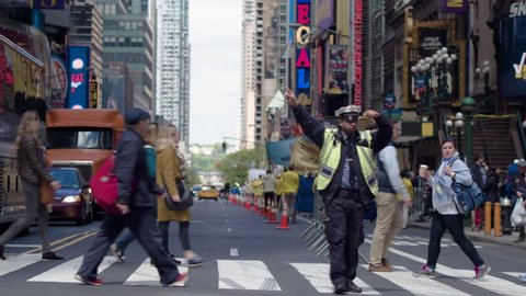 New York, Usa, 05.05.2017. Car traffic in Manhattan. The New York Police Department regulates traffic. Dolly shot.