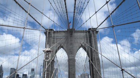 Architecture and engineering. The unique design of the Brooklyn bridge in New York. Dolly shot