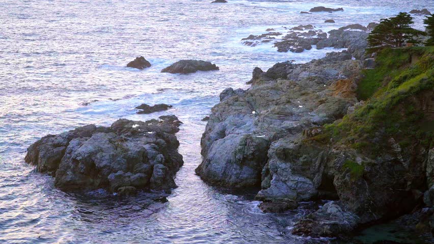 Waves hitting the rocky Coast of Big Sur California