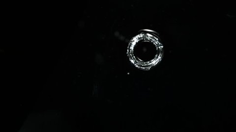 Water drops making ripple shooting with high speed camera, phantom flex.