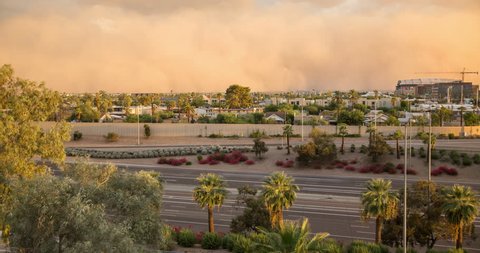 Large dust storm rolling into downtown Phoenix, Arizona during monsoon season.