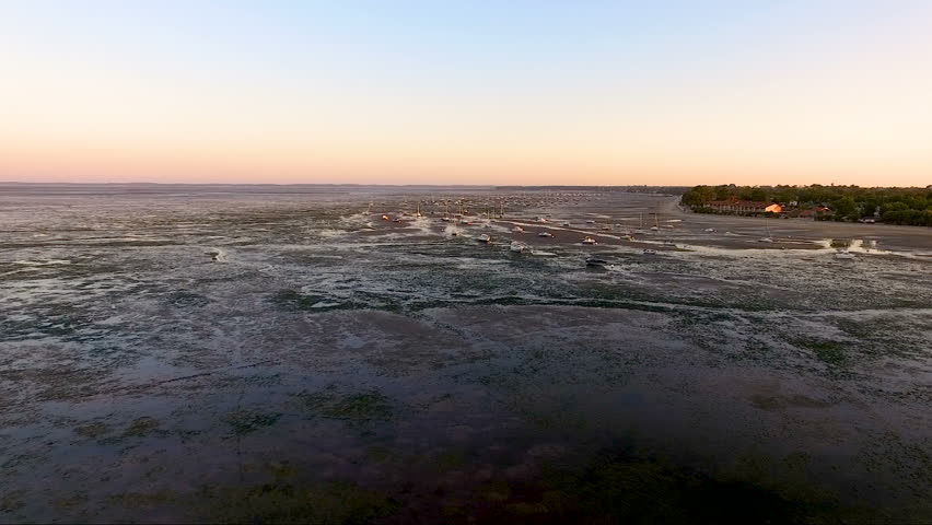 Aerial view of a coast in France under a sunset 