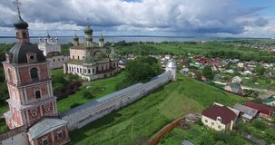 4K aerial video footage view of medieval beautiful Gorickiy monastery, church,  cathedral and hilly area around it in Pereslavl-Zalesskiy on Golden Ring route 120 km from Moscow, Russia in summer day