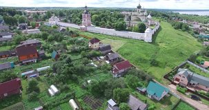 4K aerial video footage view of medieval beautiful Gorickiy monastery, church,  cathedral and hilly area around it in Pereslavl-Zalesskiy on Golden Ring route 120 km from Moscow, Russia in summer day