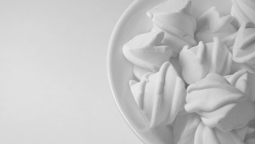 white marshmallows candy (rotating)