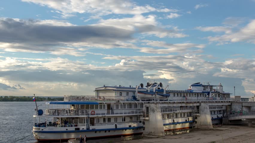 Samara Russia - July, 2017: River cruise passenger ships moored on the Volga in Samara, Russia. The Volga is the longest river in Europe, time lapse