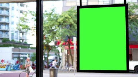 Motion of green screen for your ad beside of mall entrance with 4k resolution.