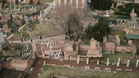 Panorama of Rome in Italy with Arch of Septimius Severus, antique monuments, columns, the House of Vestals.