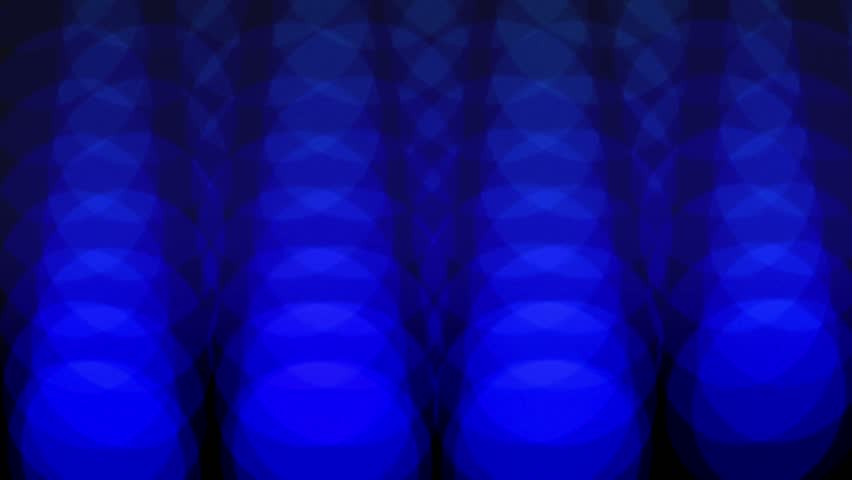 Blue spot lights abstract bokeh. Cable bridge lights at night out of focus. 
