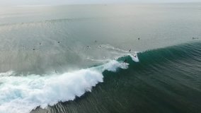 Amazing Aerial Slow Motion Video Surfers Ride on the Waves in the Ocean, Bali, Indonesia