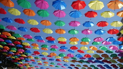 Lots of umbrellas coloring the sky. Umbrella Sky Project in Torremolinos, Spain.