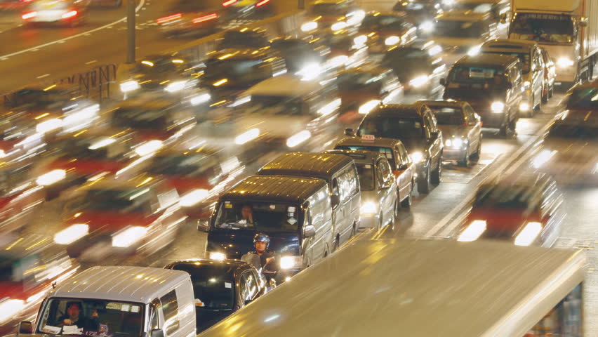 HONG KONG - MARCH 11: Zoom out Time lapse of Hong Kong Night Traffic on March