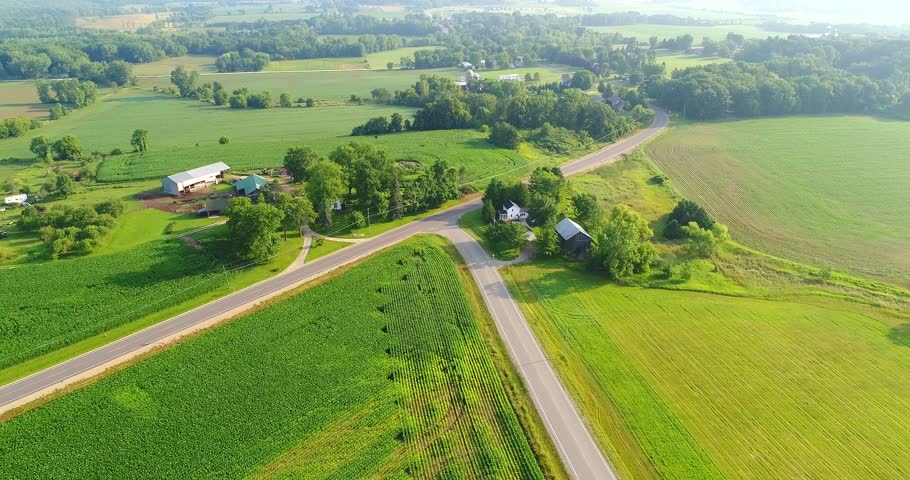 Beautiful rural Wisconsin, healthy crops growing in lush fields.
