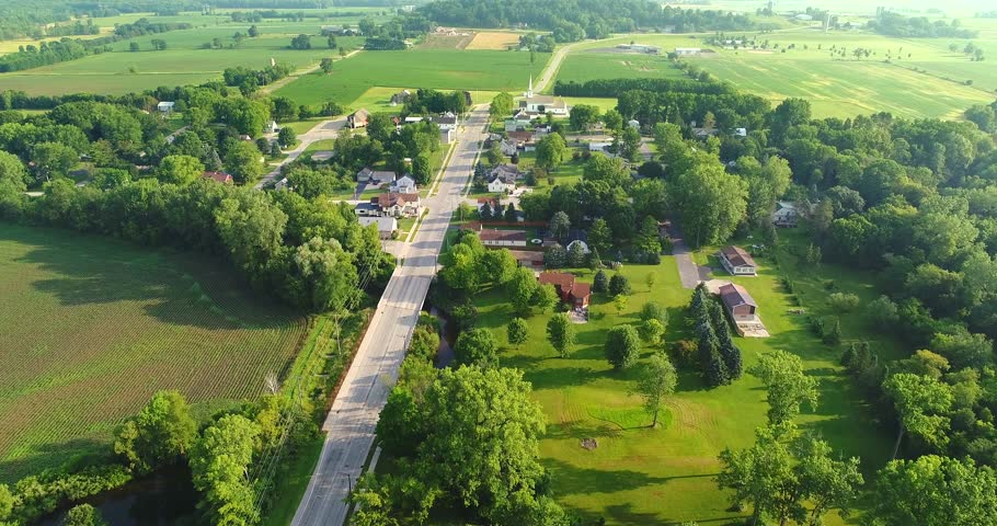 Scenic small town nestled amid fertile valley in beautiful rural Wisconsin