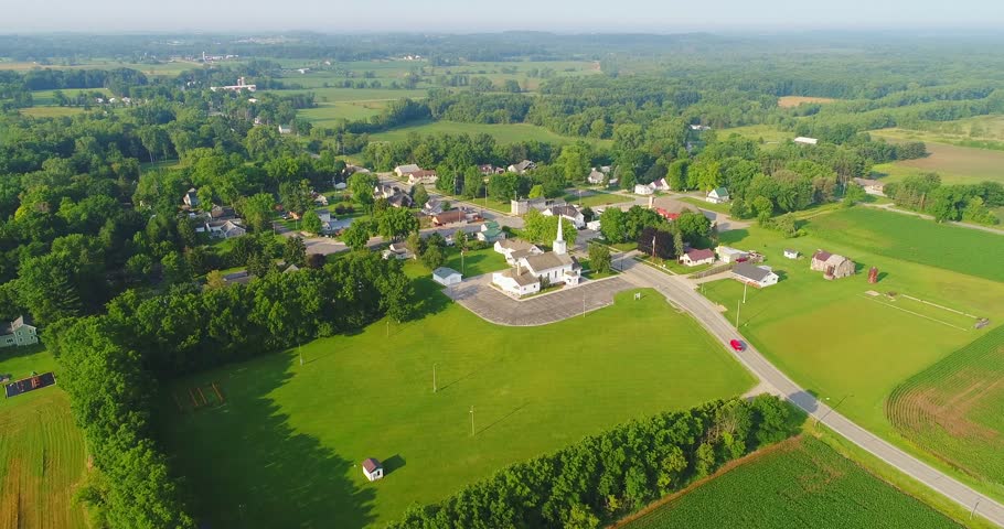 Scenic small town nestled amid fertile valley in beautiful rural Wisconsin
