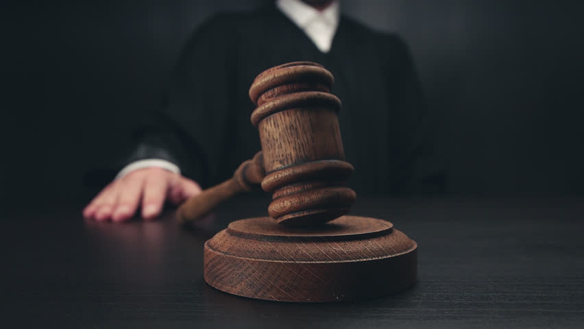 judge Knocking wooden gavel