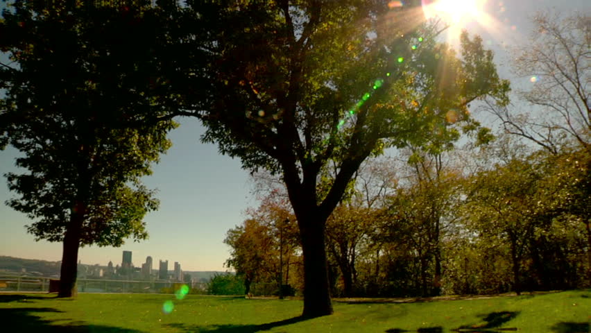 A young woman jogs at the West End Overlook in Pittsburgh on a sunny Autumn day.