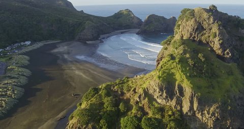 Aerial over beach at piha towards lion rock, Auckland, New Zealand