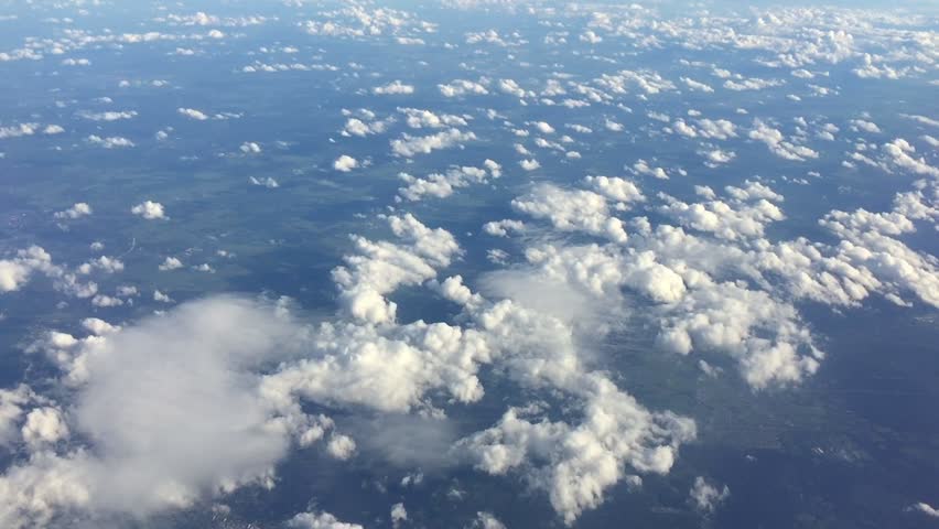 Sky clouds background. Flight high above land in clouds. On sky view. Aerial flyght in blue sky. Heavenly sky view of fly through clouds. Royalty-Free Stock Footage #28811125