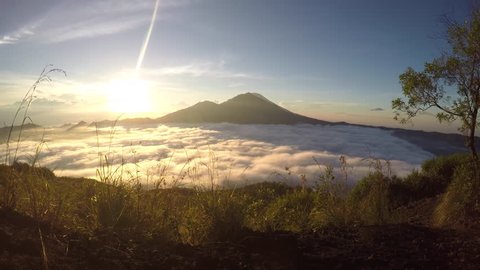 Gunning Batur Volcano on Bali Island Indonesia sunrise time-lapse 