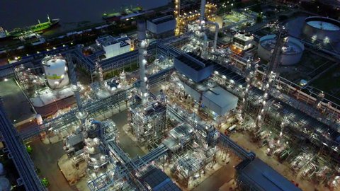 4K Night aerial shot of off oil refinery