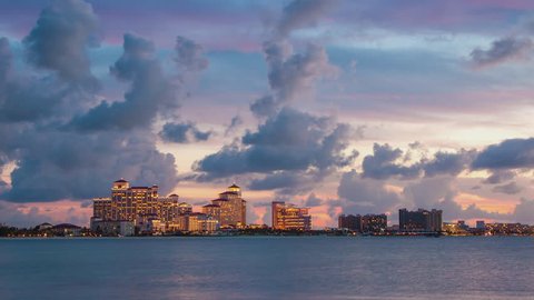 Sunset Timelapse of Resort Hotels on Goodman’s Bay in Nassau Bahamas with Fast Moving Clouds in a Vibrant Colored Sky