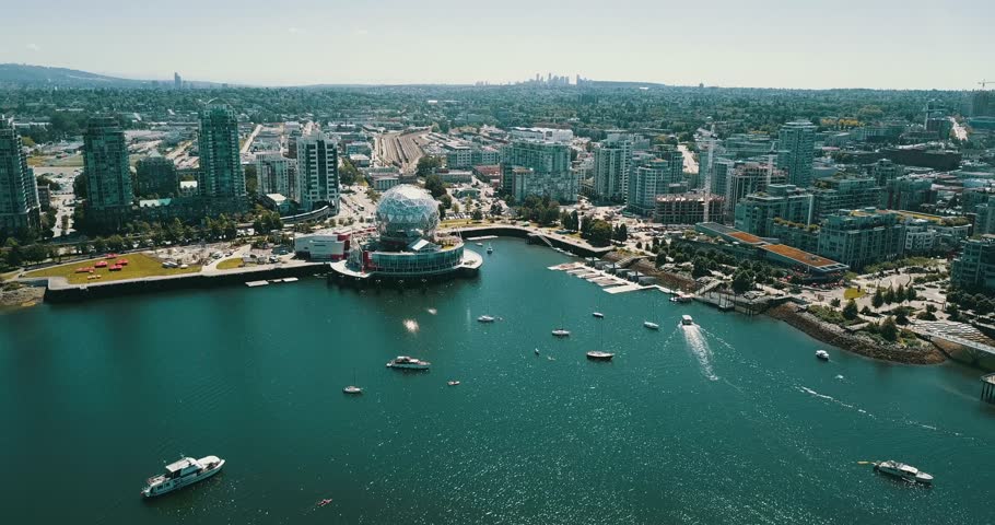 VANCOUVER,CANADA - CIRCA July 2017 :aerial pan of science world and olympic village