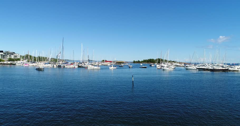 Hanko harbor, Cinema 4k aerial view over a lot of boats, in ita-satama, on hango regatta day, in the finnish archipelago city Hanko, Finland