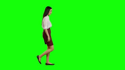 Girl hurries to the negotiations, she does not have time, starts to run. Green screen