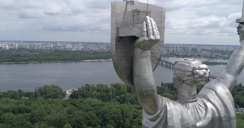 Ukraine. Kiev. June 11, 2017. Motherland. Aerial photography. 4K video. Summer. Overcast. Panorama. Sculpture. Museum of the History of Ukraine in World War II. Victory Day. River Dnieper. Panorama.