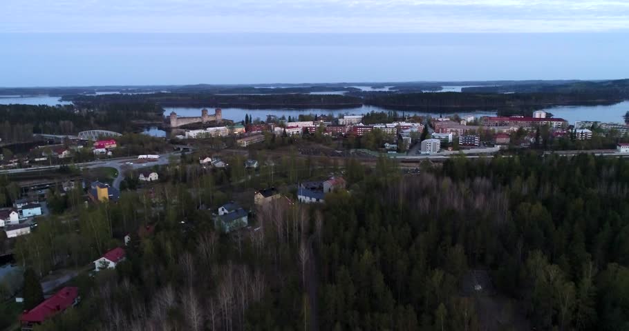 Savonlinna, Cinema 4k rising aerial view of Savonlinna cityscape, at a sunny evening, in Savo, Finland