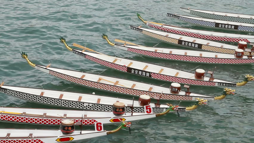 HONG KONG - JUNE 18: Dragon boats on Victoria Harbor in Hong Kong International