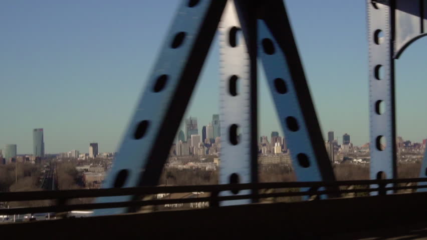 View of the Philadelphia Skyline while driving over the Betsy Ross Bridge, in slow motion