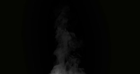 Boiling Steam in the Kitchen. White Steam rises from a large pot that is behind the scenes. Black background. Filmed at a speed of 120fps