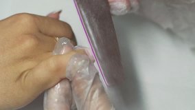 female hands make manicure close-up