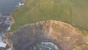 Beautiful Sunset Aerial From The Cliffs of Moher Conty Clare Ireland. Epic Scenic Irish Rural Landscape and Seascape along the wild Atlantic way route.. West Of Ireland Countryside. Flat video