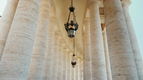 High white columns, the wing of St. Peter's Church, the Vatican City. Piazza San Pietro, Rome, Italy. POV video