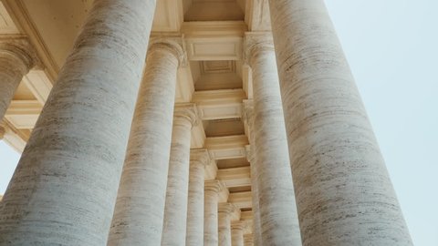 White columns of St. Peter's Church, the Vatican City. Piazza San Pietro, Rome, Italy. POV video