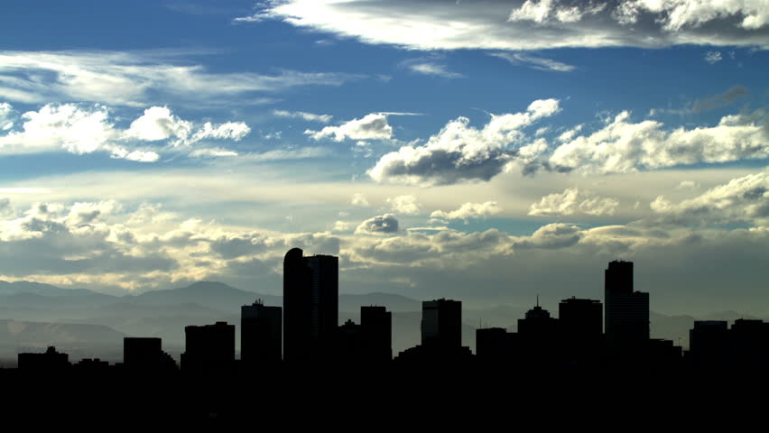 Denver Skyline at Dusk, with fascinating clouds. HD 1080p timelapse.