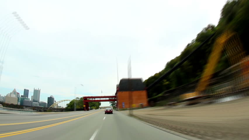 A time lapse view of driving in and out of downtown Pittsburgh, Pennsylvania.