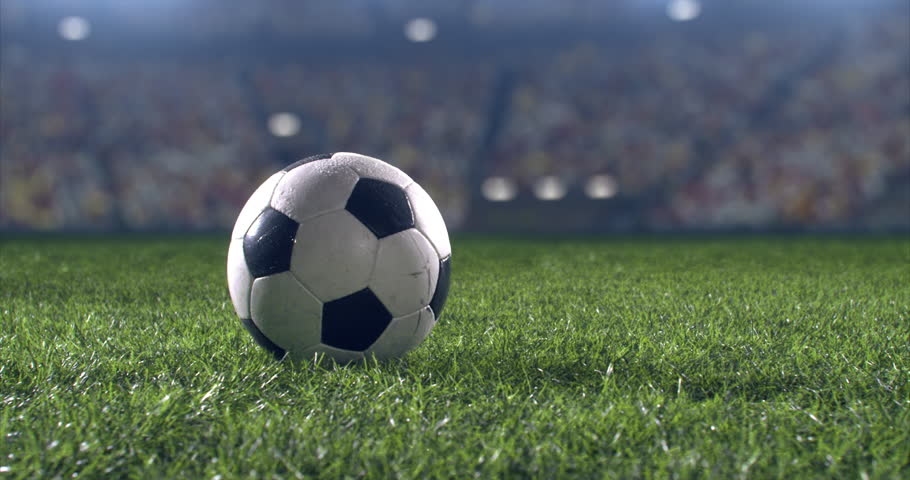 Soccer player performs outstanding play during a soccer game on a professional outdoor soccer stadium. Player wears unbranded uniform. Stadium and crowd are made in 3D. Royalty-Free Stock Footage #28910518