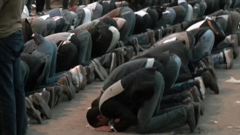 CAIRO, EGYPT – CIRCA DEC 2011: Muslim are praying in Tahrir Square during the clashes
circa December in Cairo, Egypt.