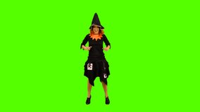 The witch cooks a magical potion for spell greenscreen  shot with alpha channel 
