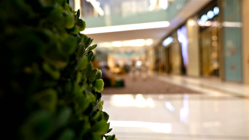 Defocused unrecognizable shoppers people at Dubai Mall, the world