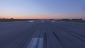 Airplane accelerates over the runway - POV 4K
