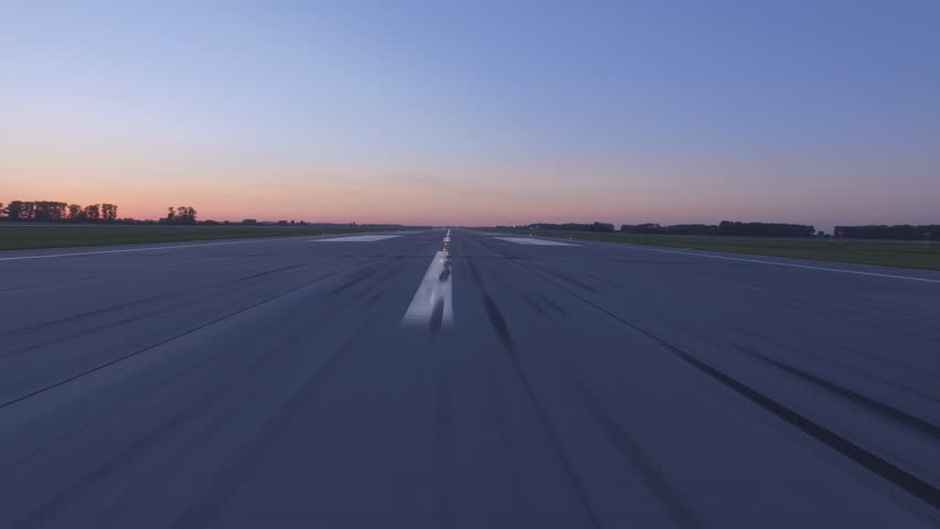 Airplane accelerates over the runway - POV 4K Royalty-Free Stock Footage #28924948