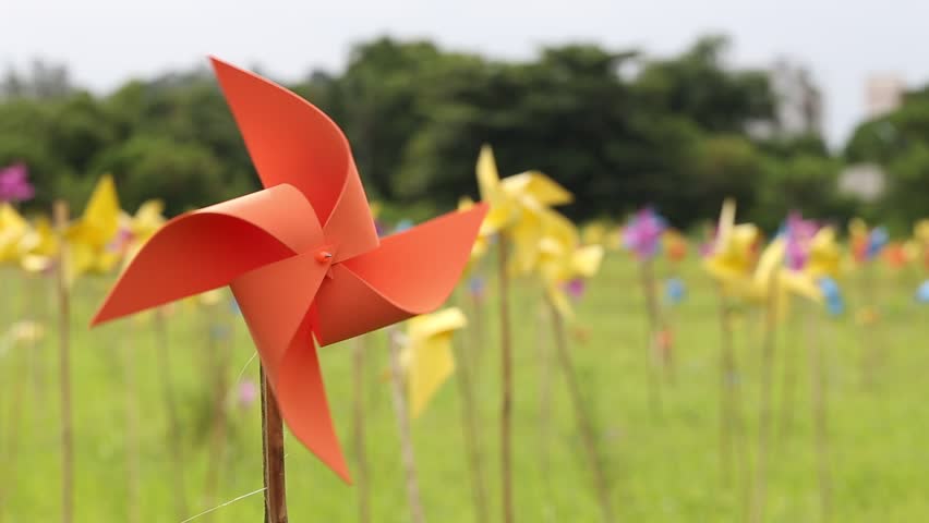 Small Orange Paper Windmills Stick Stock Footage Video (100% Royalty
